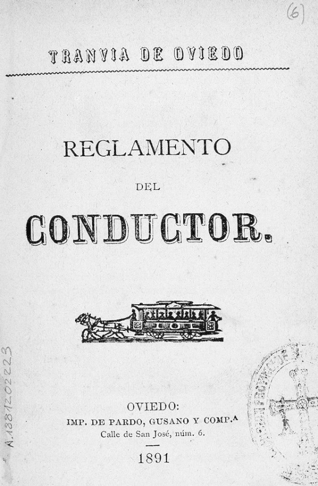 Altes Buch mit dem Titel "Reglamento de Conductor" und einer Zeichnung eines Zuges auf dem Cover und einem Stempel auf der rechten Seite.