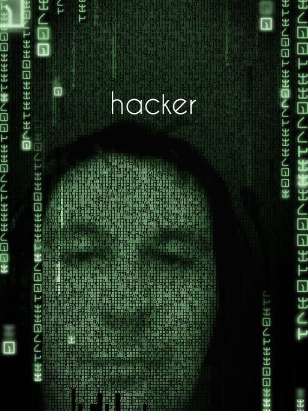 Das Gesicht eines Hackers auf einem Computermonitor mit dem Wort "Hacker" und umgebender Binärcode.