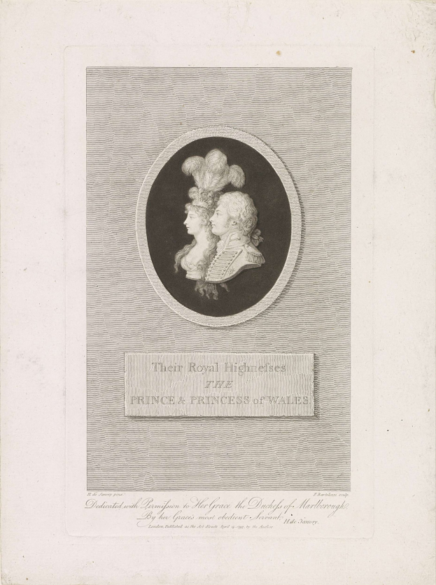 Eine Zeitung mit einem Bild des Prinzen und der Prinzessin von Wales neben dem Text.